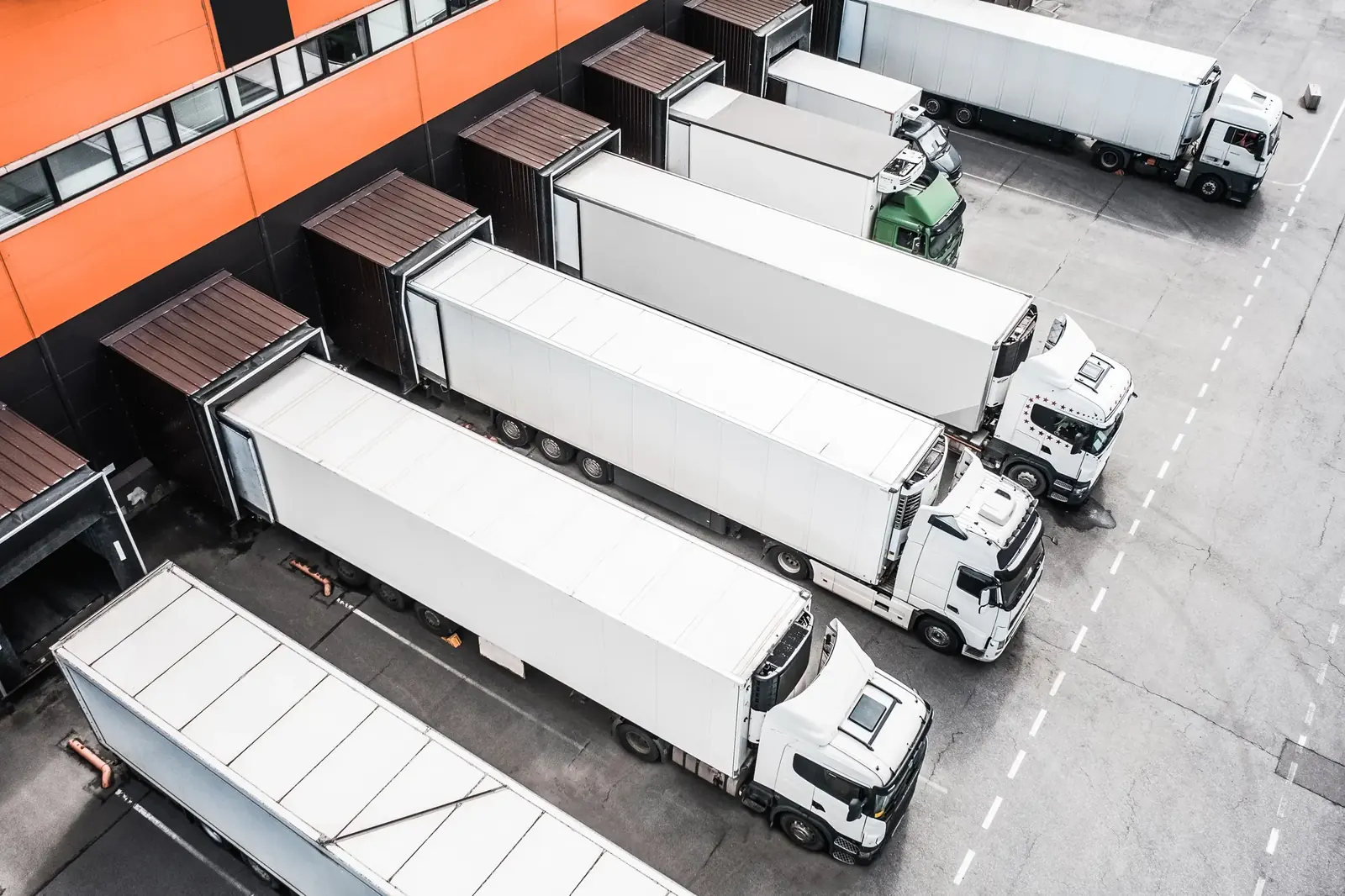 Box trucks parked at loading docks